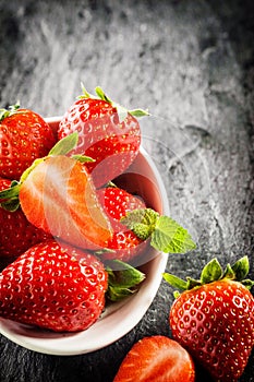 Bowl of ripe red strawberries