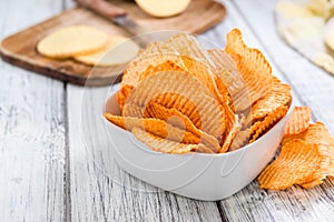 Bowl with rippled Potato Chips