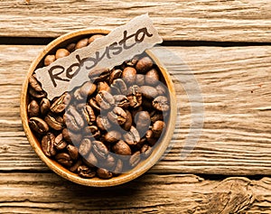 Bowl of Robusta coffee beans