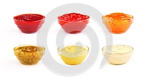 Bowl with sauce set isolated on white background