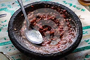 Bowl with selfmade sambal at a local warung photo
