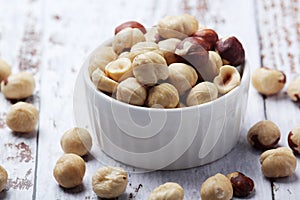 A bowl with shelled hazel nuts