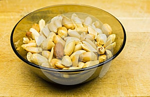 Bowl with shelled peanuts groundnut, goober.