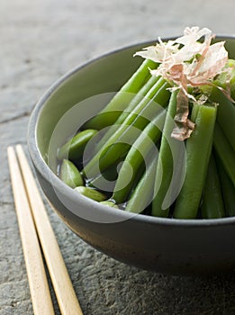 Bowl of Simmered Beans And Bonito Flakes photo