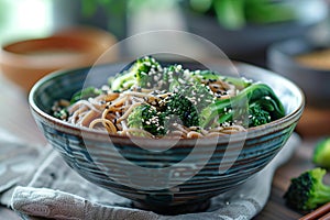 Bowl of soba noodles with pacha choy, broccoli, soy sauce and black sesame