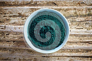 Bowl of spirulina algae powder