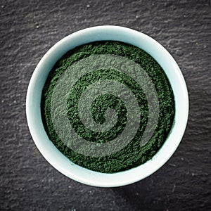 Bowl of spirulina algae powder