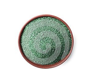 Bowl of spirulina algae powder isolated on white
