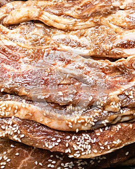 Bowl of raw beef rib steaks