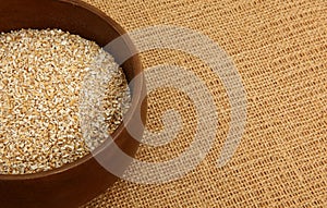 Bowl Of Steel Cut Oatmeal On Burlap Bag