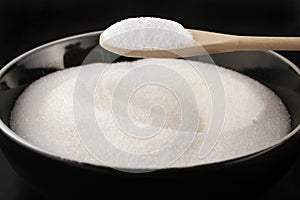 Bowl of sugar with spoon