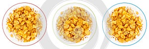 Bowl of sweet cornflakes with milk isolated on white background, top view