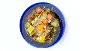 A bowl of tamarind vegetables served on a Sundanese menu