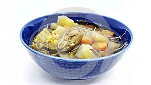 A bowl of tamarind vegetables served on a Sundanese menu