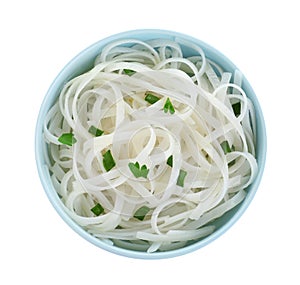 Bowl of tasty cooked rice noodles and herbs isolated on white