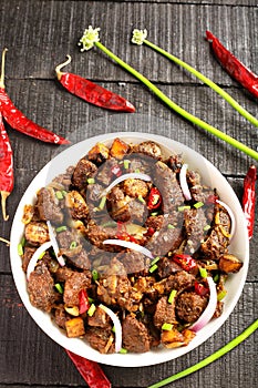 Bowl of tasty mutton  fry. Kerala foods background.