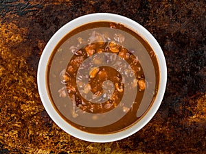 Bowl of Thick Chunky Vegetable and Bean Soup