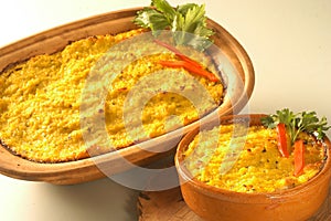 Bowl of traditional Chilean Pastel de Choclo (corn pie)
