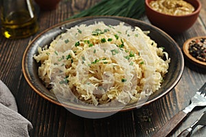 A bowl with traditional German Sauerkraut served in rustic style