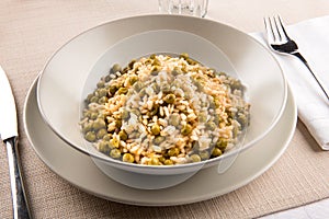 Bowl of traditional Risi e Bisi from the Veneto photo