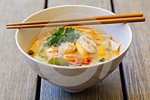 Bowl of traditional Thai tom yam soup