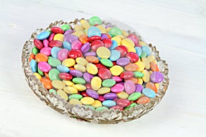 Bowl ull of colorful and sweet smarties