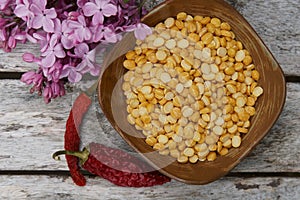 A bowl of uncooked Chana daal photo