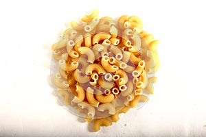 Bowl of uncooked elbow macaroni pasta