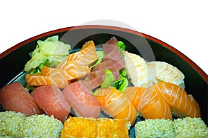 Bowl With Various Sashimi And Sushi Rolls