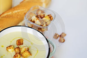 Bowl of vegetable soup. Cauliflower soup puree with croutons.