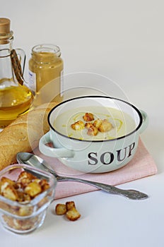 Bowl of vegetable soup. Cauliflower soup puree with croutons.