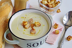 Bowl of vegetable soup. Cauliflower soup puree with croutons.