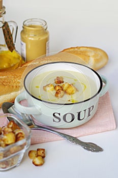 Bowl of vegetable soup. Cauliflower soup puree with croutons.