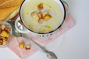 Bowl of vegetable soup. Cauliflower soup puree with croutons.