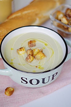 Bowl of vegetable soup. Cauliflower soup puree with croutons.