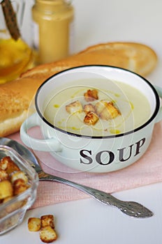 Bowl of vegetable soup. Cauliflower soup puree with croutons.