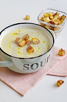 Bowl of vegetable soup. Cauliflower soup puree with croutons.