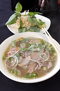 Bowl of Vietnamese pho noodle soup photo