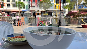 Bowl of Vietnamese traditional pho chicken noodle soup in a street restaurant, Tan Chau, Vietnam, Indochina, Southeast