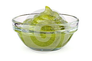 Bowl with wasabi isolated on white
