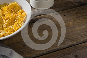 Bowl of wheaties cereal breakfast on wooden table