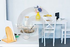 bowl with whisk on kitchen counter, kitchen table