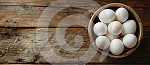 Bowl of White Eggs on Wooden Table
