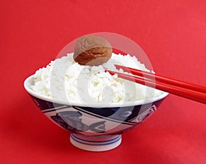 Bowl of white rice with ume