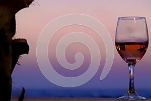 A bowl of wine at sunset