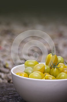 A Bowl of Yellow Tomatoes