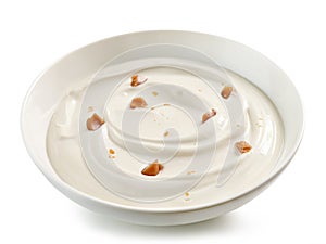 Bowl of yogurt with caramel pieces