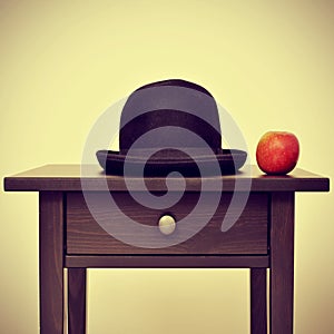Bowler hat and apple, homage to Rene Magritte painting The Son o photo