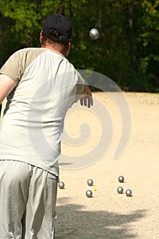 Bowler playing petanque