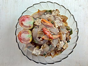 A bowlful of spicy cowhide or cow skin soup